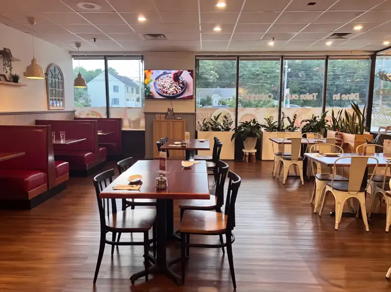 Full view of the Cozy Pho & Thai dining room set for guests